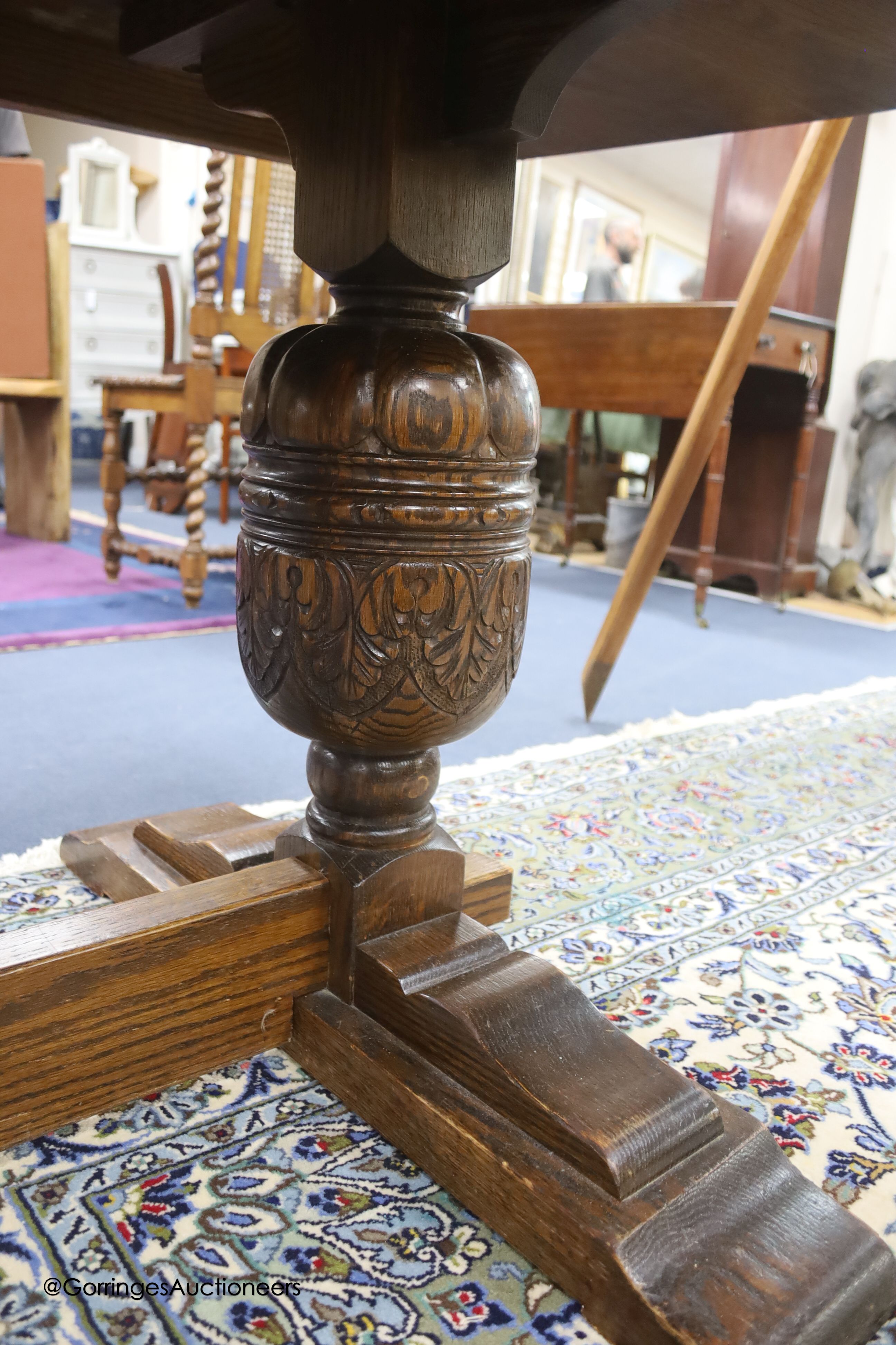 A reproduction 18th century style oak refectory table, width 310cm depth 91cm height 76cm